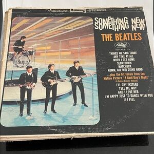 The Beatles Album Art in Black and Orange